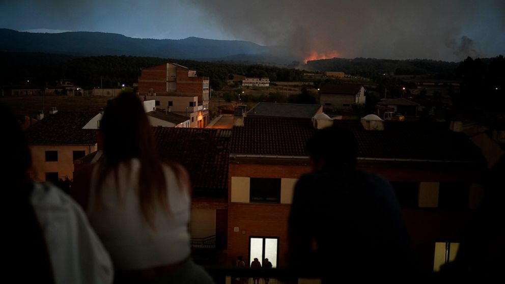 Rain brings crucial help against wildfire in Northeast Spain