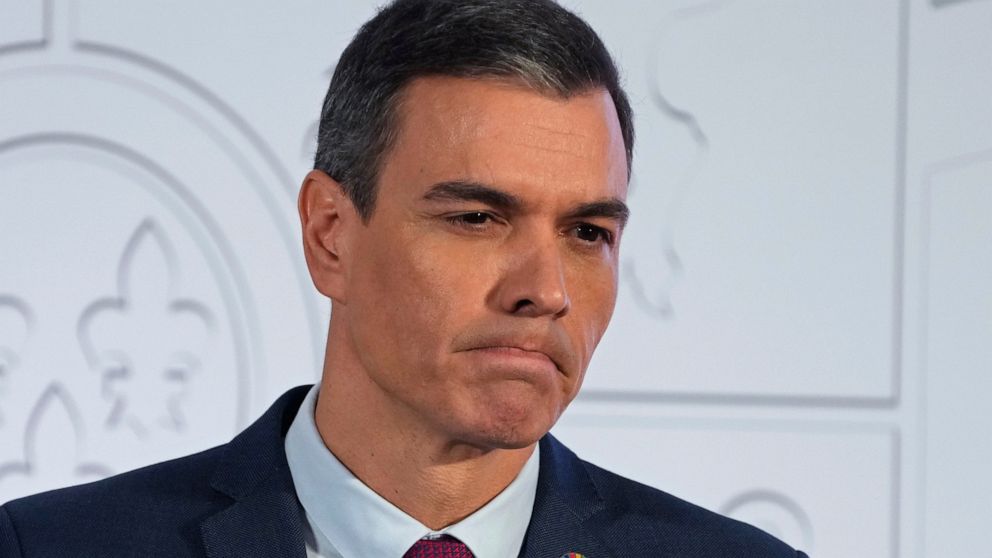 Spain's Prime Minister Pedro Sanchez listens to a question during a news conference to give a roundup of the economic and political situation over the past year in Madrid, Spain, Tuesday, Dec. 27, 2022. (AP Photo/Paul White)