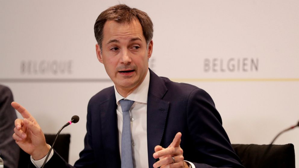 Belgium's Prime Minister Alexander De Croo speaks during a media conference, after a committee to discuss new restrictive measures regarding coronavirus, COVID-19, in Brussels, Friday, Oct. 16, 2020. Faced with a resurgence of coronavirus cases, the 