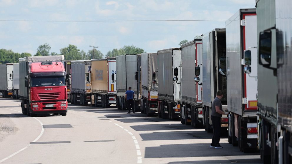 Trucks stands at the post-customs international checkpoint Chernyshevskoye at the Russian-Lithuanian border in Kaliningrad region, Russia, Wednesday, June 22, 2022. Russia’s security chief on Tuesday said Moscow will respond to Lithuania’s decision t