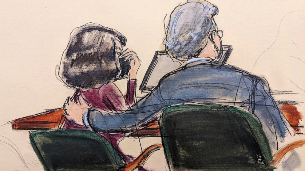 This courtroom sketch shows Ghislaine Maxwell, left, as she puts her hand up to her face, listening with her lawyer Jeffrey Pagliuca, as a jury returns a guilty verdict in her sex trafficking trial, Wednesday Dec. 29, 2021, in New York. (Elizabeth Wi