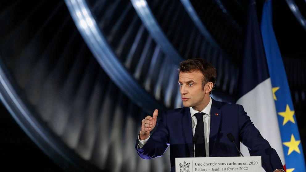 French President Emmanuel Macron delivers a speech at the GE Steam Power System main production site for its nuclear turbine systems in Belfort, eastern France, Thursday, Feb. 10, 2022. French President Emmanuel Macron unveiled plans to build new nuc