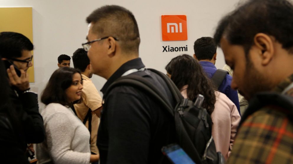 Guests gather to check out Xiaomi's newly launched products at an event in Bangalore, India, Tuesday, Sept. 17, 2019. Indian authorities on Saturday, April 30, 2022, seized $725 million from Chinese smartphone company Xiaomi after an investigation fo