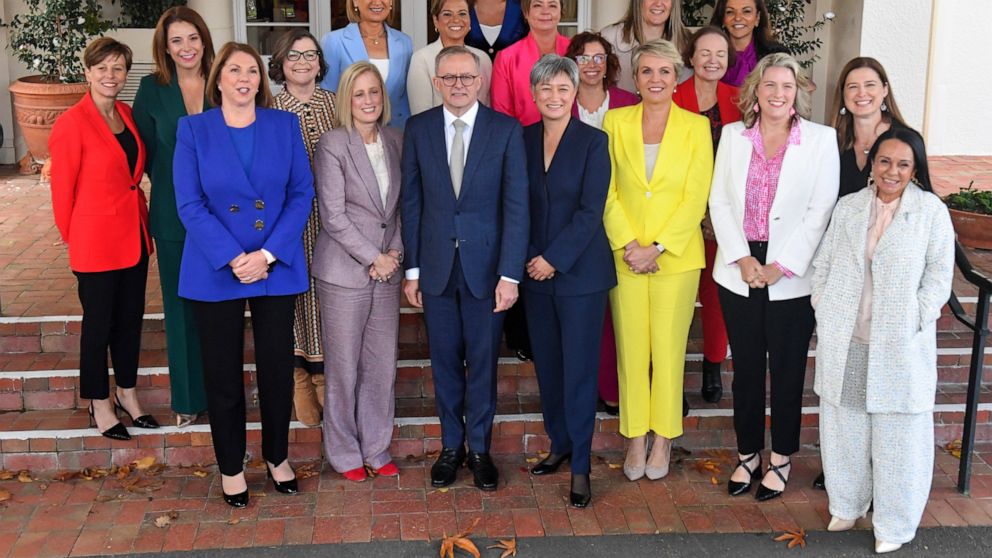 Australian Prime Minister Anthony Albanese, front center, and his ministers pose for a group photo after their swearing-in ceremony at Government House in Canberra, Australia, Wednesday, June 1, 2022. Australia's new cabinet was sworn in at the natio