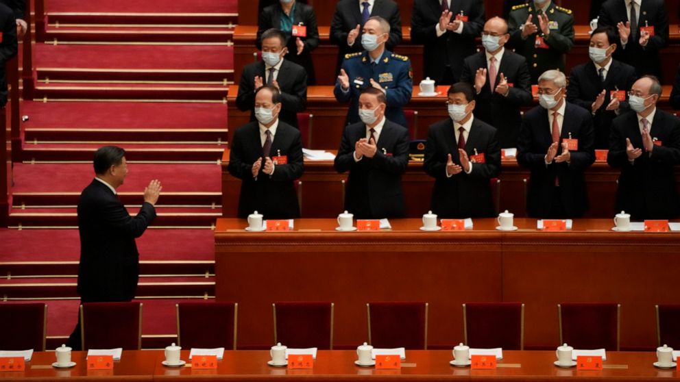 China's Xi calls for military growth as party congress opens