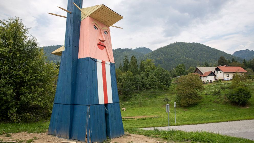 FILE - In this file photo dated Friday, Aug. 30, 2019, a wooden statue resembling Donald Trump near Kamnik, Slovenia. The wooden statue nearly eight-meter high (26 feet) of U.S. President Donald Trump that was constructed in 2019, has been destroyed 