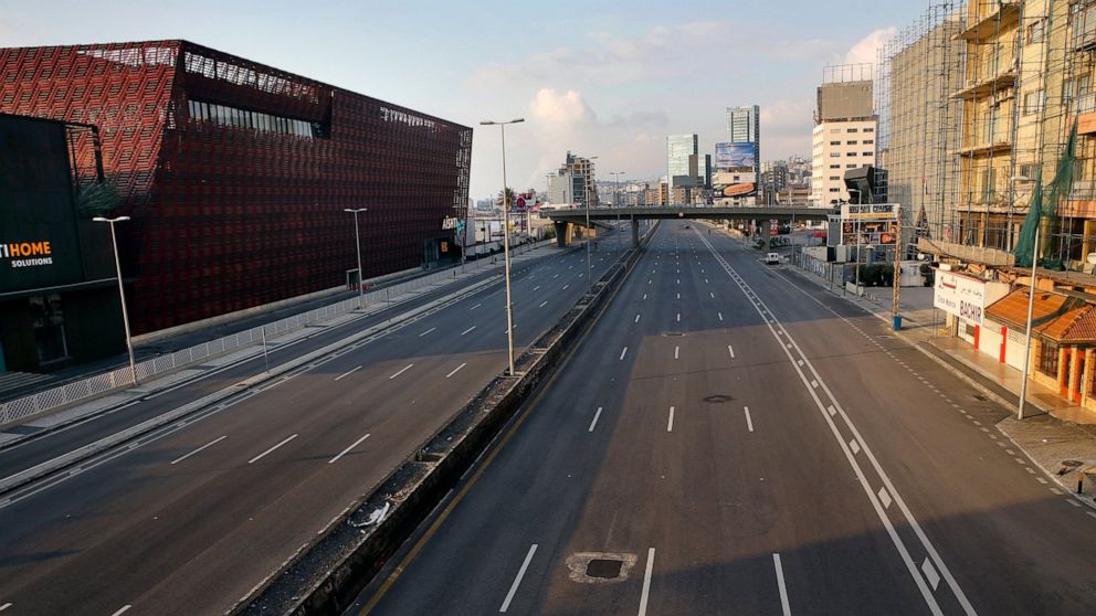 A highway is empty of cars during a lockdown aimed at curbing the spread of the coronavirus, in Beirut, Lebanon, Sunday, April 12, 2020. (AP Photo/Bilal Hussein)