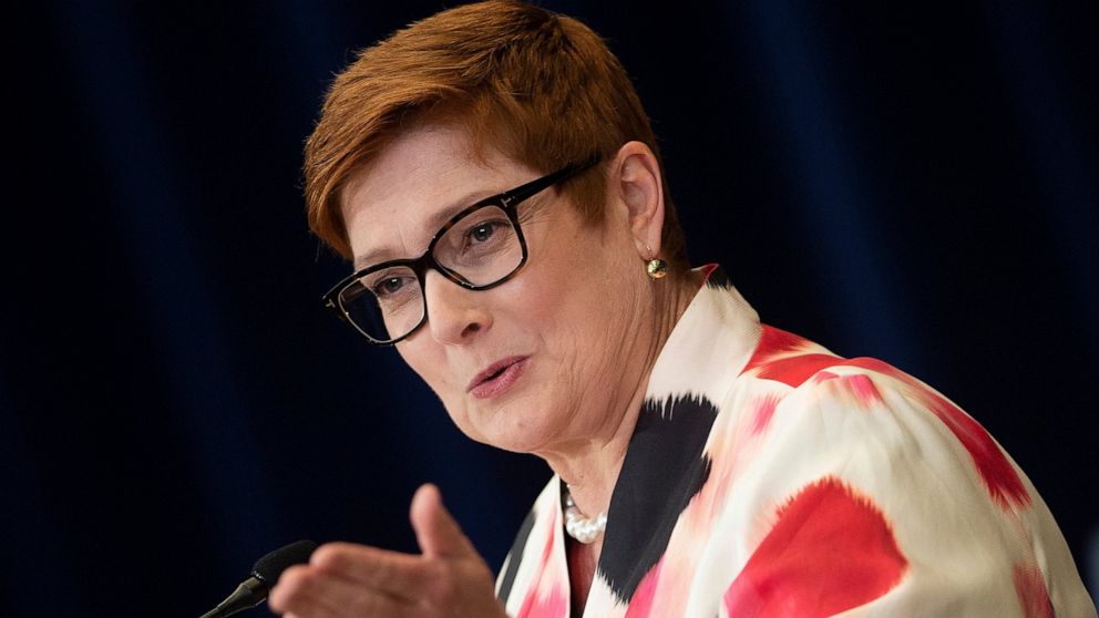 FILE - In this July 28, 2020, file photo, Australia's Foreign Minister Marise Payne speaks at a news conference at the State Department, in Washington. Australia has suspended its defense cooperation with Myanmar and is redirecting humanitarian aid b