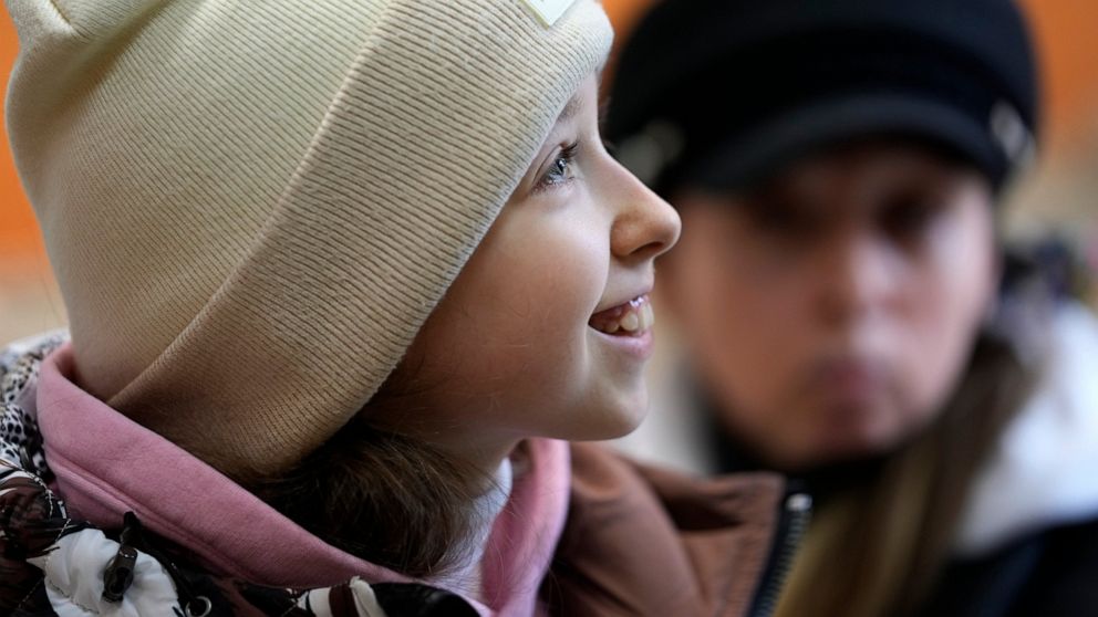 1 million children leave behind lives, friends in Ukraine