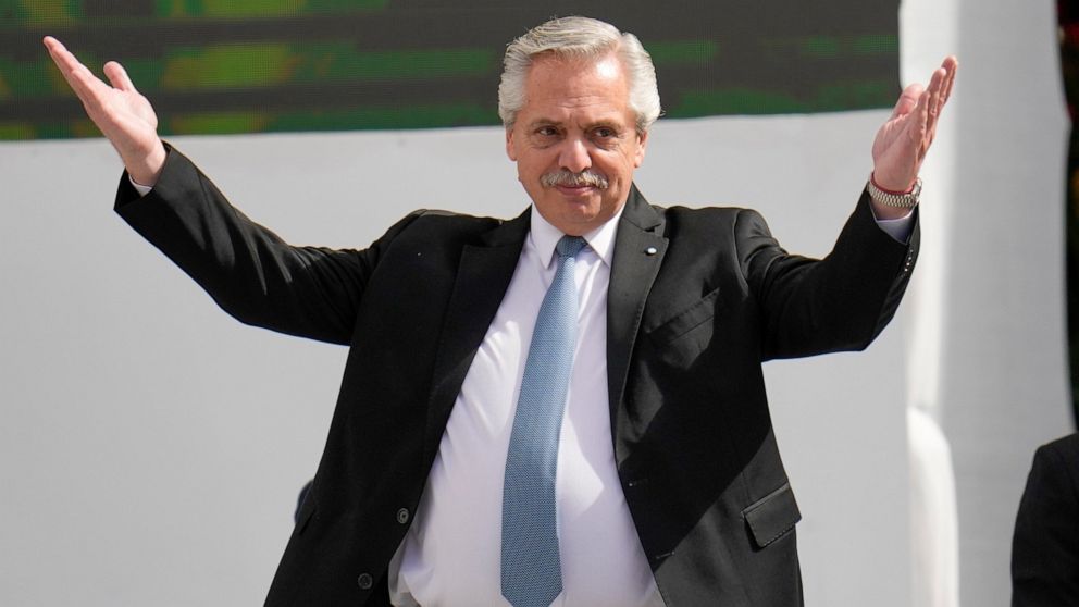 Argentina's President Alberto Fernández waves during the swearing-in ceremony for Colombia's new President Gustavo Petro in Bogota, Colombia, Sunday, Aug. 7, 2022. (AP Photo/Fernando Vergara)