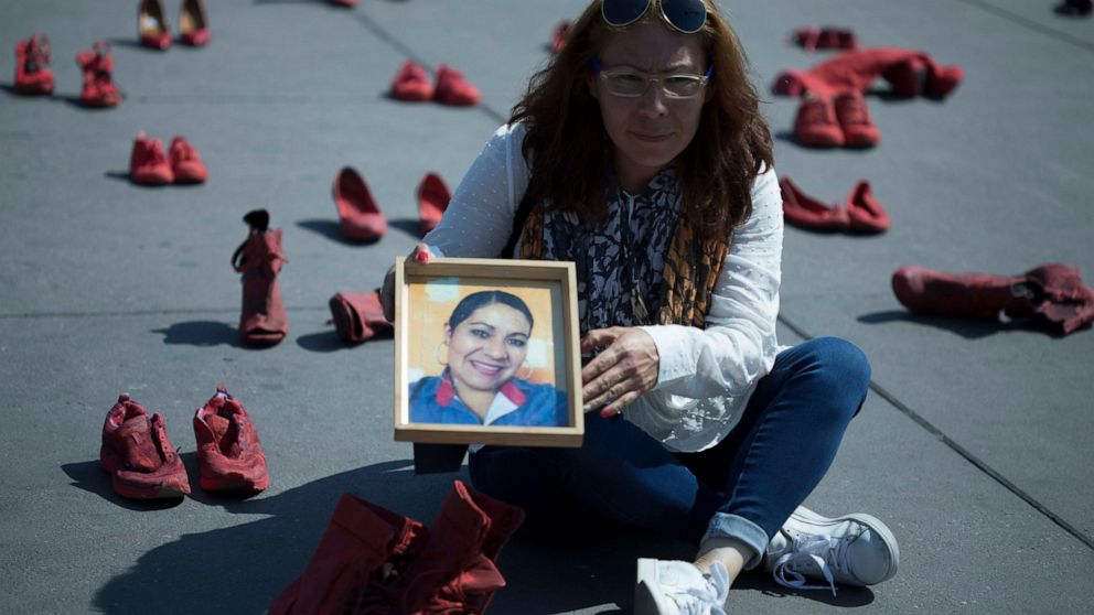 In Mexican capital, red shoes to protest killings of women thumbnail