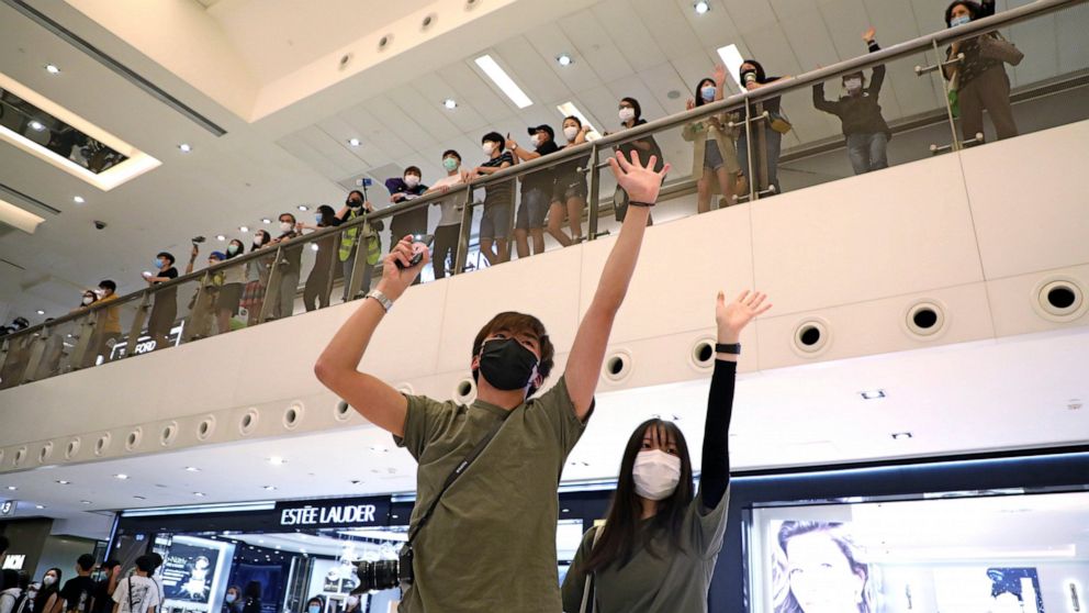 Hong Kong police spray tear gas in protest at shopping mall - ABC News
