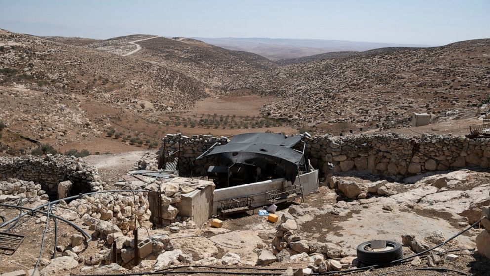 FILE - A stockyard that suffered damage following a settlers' attack from nearby settlement outposts on the Bedouin community, in the West Bank village of al-Mufagara, near Hebron, Thursday, Sept. 30, 2021. Israel’s Supreme Court has upheld a long-st
