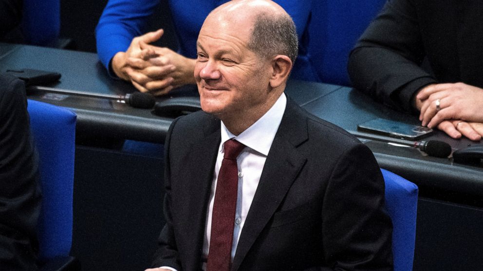 Scholz succeeds Merkel as German chancellor, opening new era