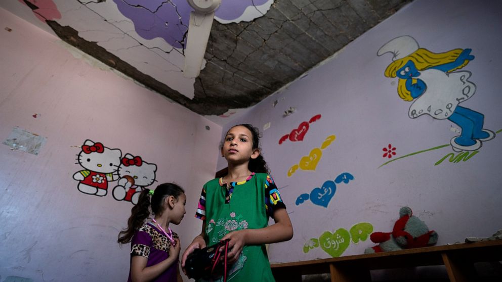 AP PHOTOS: Shattered rooms show Gaza war's toll on children