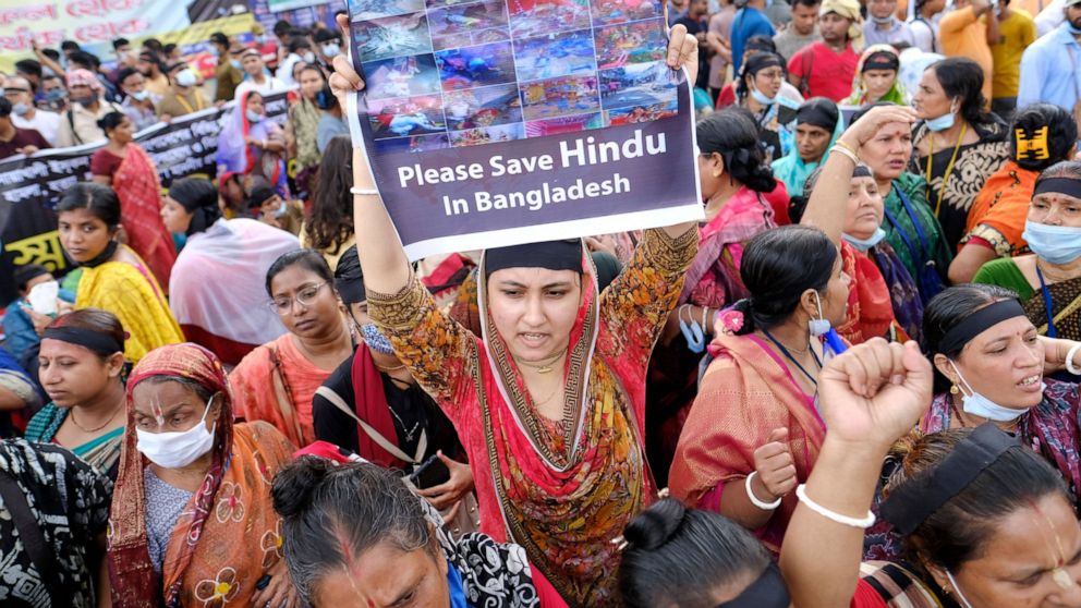 Hundreds of Hindus protesting against attacks on temples and the killing of two Hindu devotees in another district shout slogans in Dhaka, Bangladesh, Monday, Oct.18, 2021. A viral social media image perceived as insulting to the country's Muslim maj