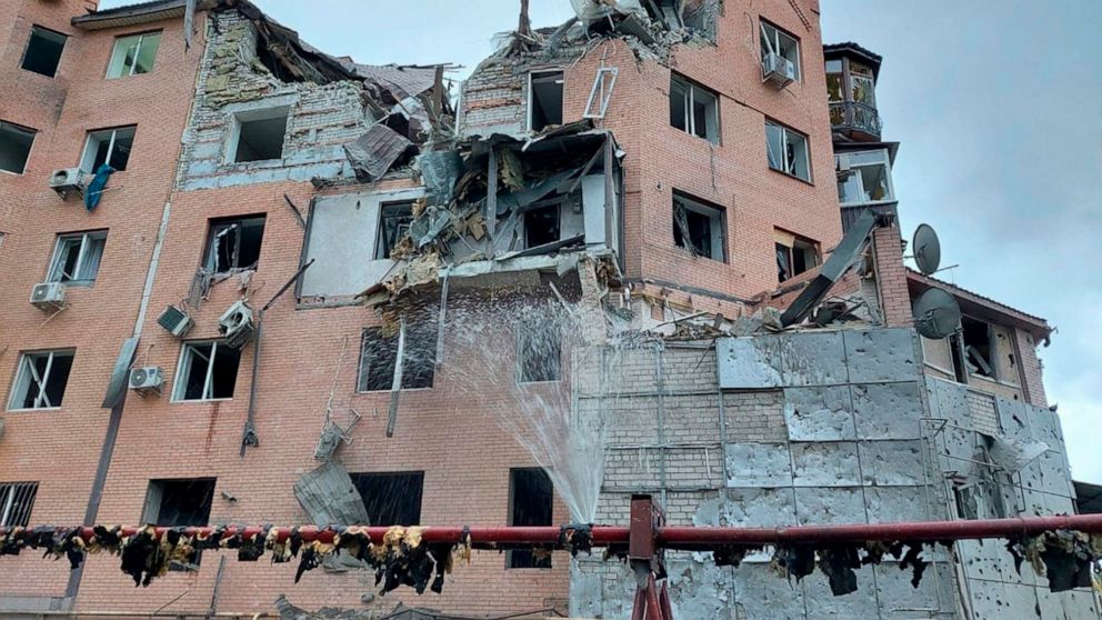 In this photo posted by the mayor of Mykolaiv on his Telegram channel, a residential building is seen damaged following night shelling in Mykolaiv, Ukraine, Sunday, Oct. 23, 2022. A nearby 10-story residential building was also damaged. The windows a