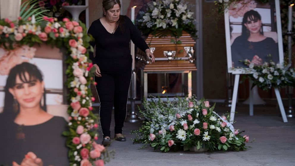 A woman attends the wake of mayoral candidate Alma Barragan in Moroleon, Mexico, Wednesday, May 26, 2021. Barragan was killed Tuesday while campaigning for the mayorship of the city of Moroleon, in violence-plagued Guanajuato state. (AP Photo/Armando