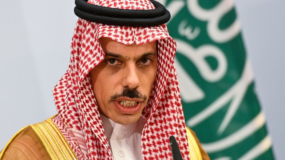Saudi Foreign Minister Prince Faisal bin Farhan Al-Saud arrive for a press conference in Berlin, on Aug. 19, 2020.(John MacDougall/AP, pool)