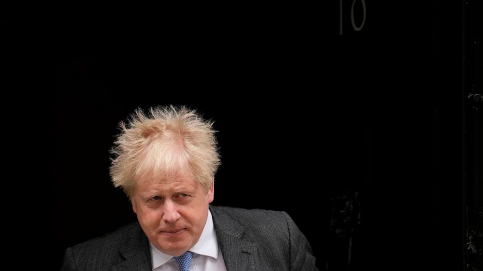 FILE - British Prime Minister Boris Johnson leaves 10 Downing Street to attend the weekly Prime Minister's Questions at the Houses of Parliament, in London, Wednesday, April 27, 2022. When British Prime Minister Boris Johnson survived a no-confidence