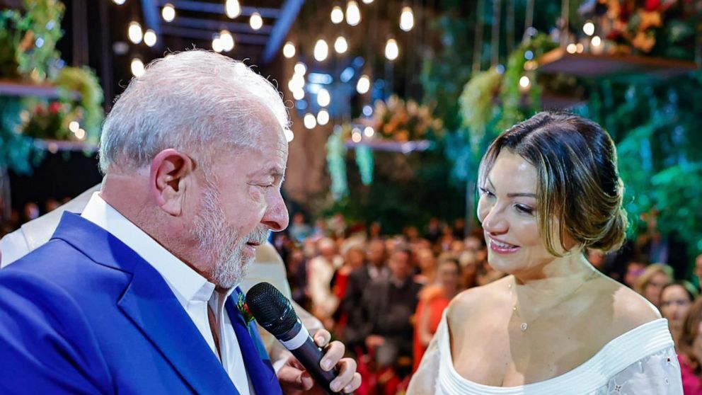 In this photo released by the 2022 campaign press office of Luiz Inacio Lula da Silva, Brazil's former president Luiz Inacio Lula da Silva, left, and sociologist Rosangela Silva get married in Sao Paulo Brazil, Wednesday, May 18, 2022. Brazil's forme