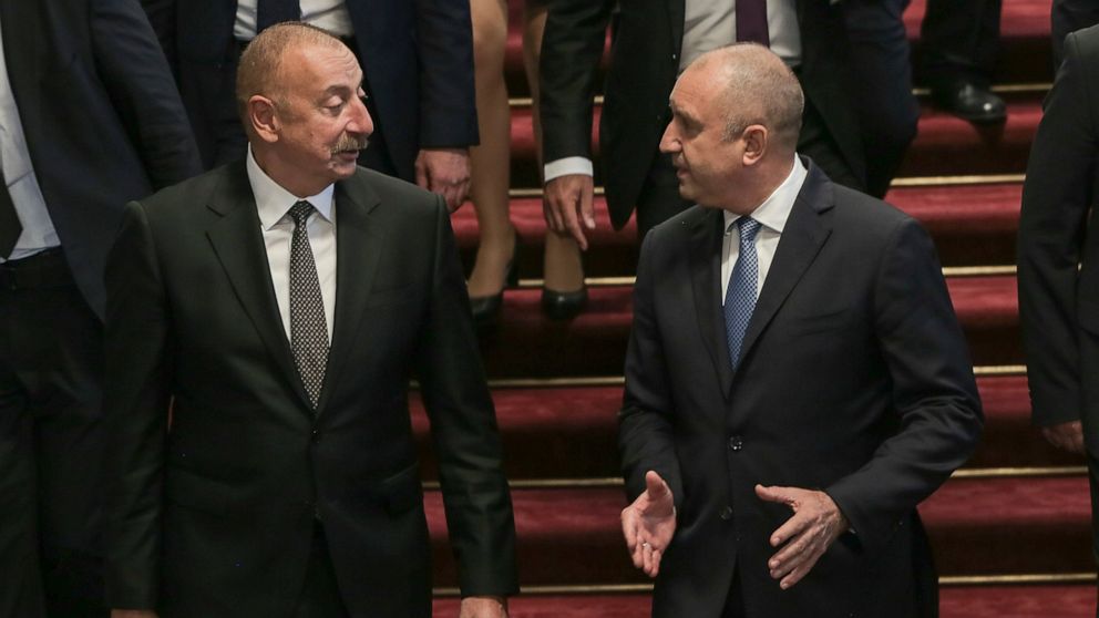 Bulgarian President Rumen Radev, right, flanked by President of Azerbaijan Ilham Aliyev during his official visit to Bulgaria in capital Sofia on Friday, Sept. 30, 2022. President Aliyev is on a two day official visit to Bulgaria and will take part i