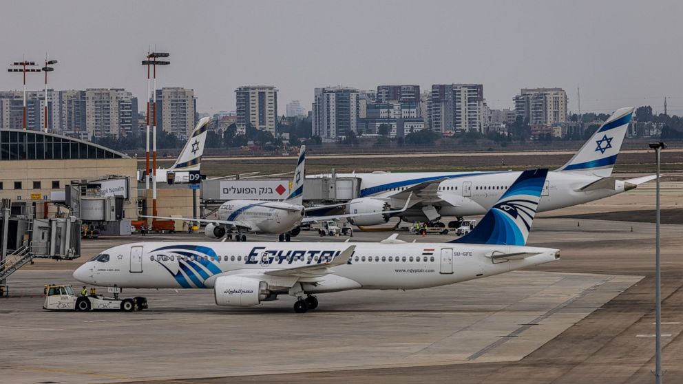 An EgyptAir Airbus 320 aircraft is seen on the tarmac at Ben Gurion International Airport in Lod, Israel, Sunday, Oct. 3, 2021. Egypt's national carrier Sunday made its first official direct flight from Cairo to Israel since the two countries signed 