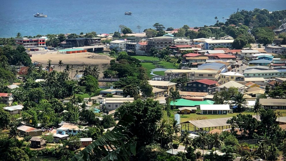 FILE - Ships are docked offshore in Honiara, the capital of the Solomon Islands, Nov. 24, 2018. The Solomon Islands' decision to switch its diplomatic allegiance from Taiwan to Beijing in 2019, has been blamed for arson and looting in the capital Hon