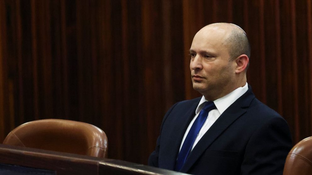 Yamina party leader Naftali Bennett looks on during a special session of the Knesset, whereby Israeli lawmakers elect a new president, at the plenum in the Knesset, Israel's parliament, in Jerusalem on Wednesday, June 2, 2021. (Ronen Zvulun/Pool Phot
