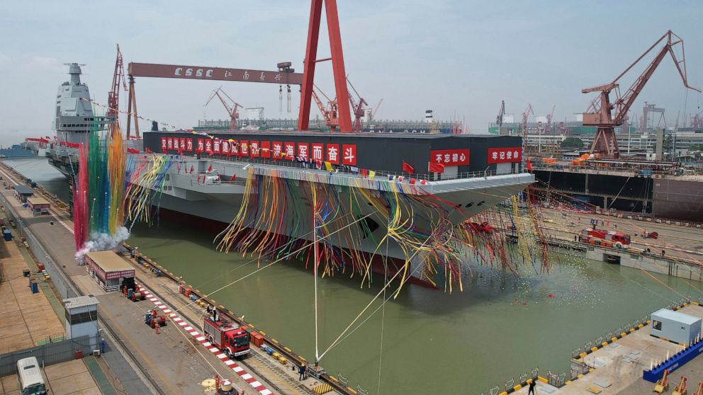 China launches high-tech aircraft carrier in naval milestone – World news
