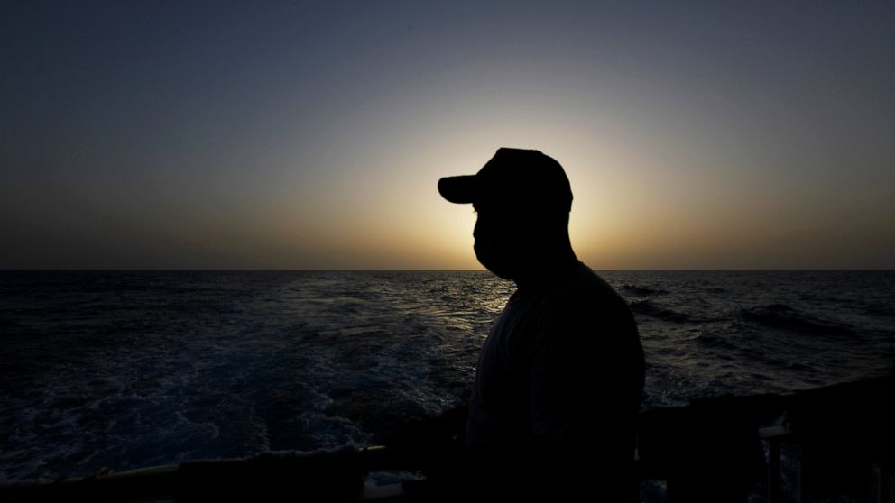 North African migrants, adrift, tell of last-minute rescue