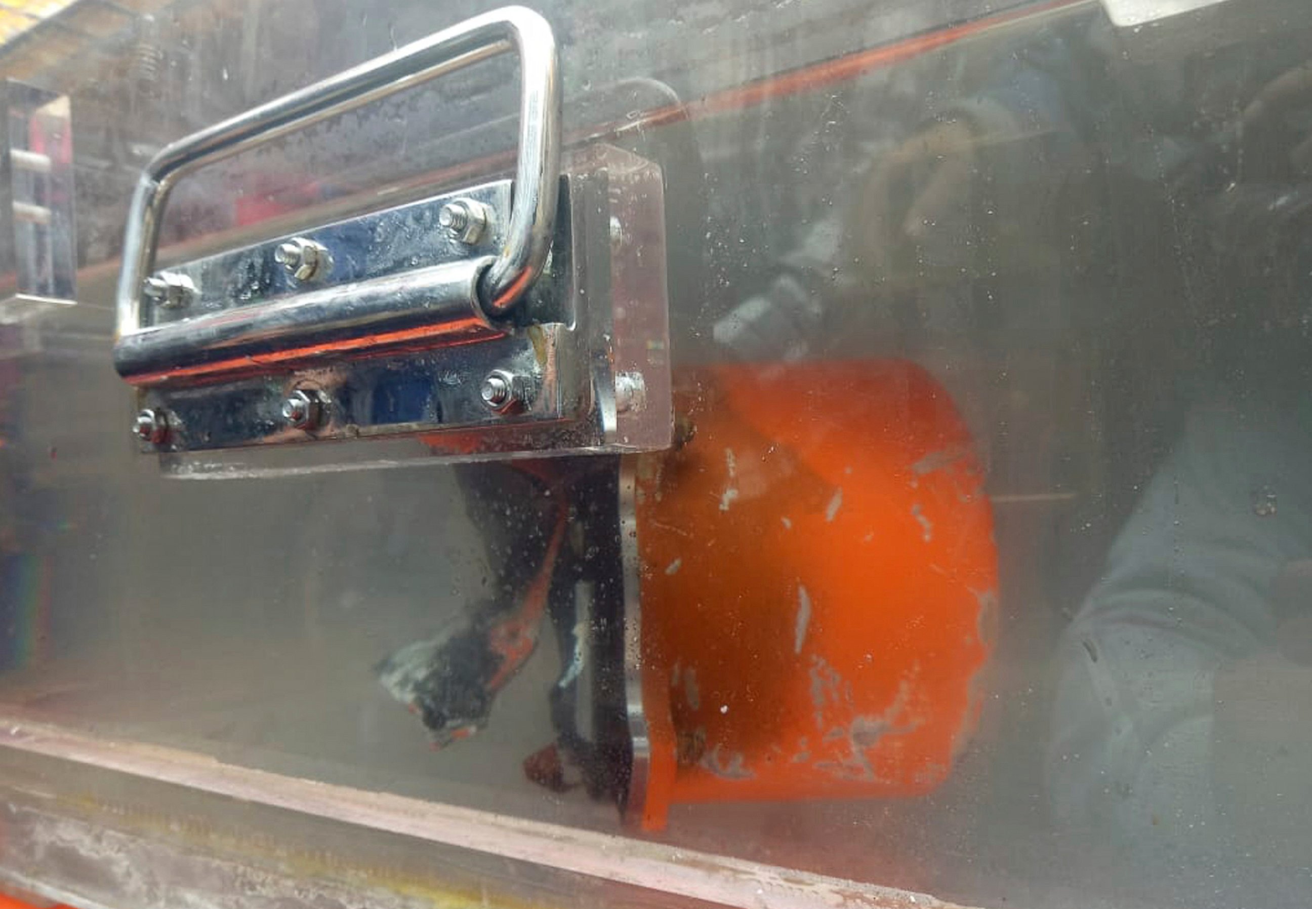 The recovered cockpit voice recorder of Lion Air flight 610 is kept in a water-filled container on board of Indonesian Navy ship KRI Spica in the waters of Tanjung Karawang, Indonesia, Monday, Jan. 14, 2019. Navy divers have recovered the cockpit voi