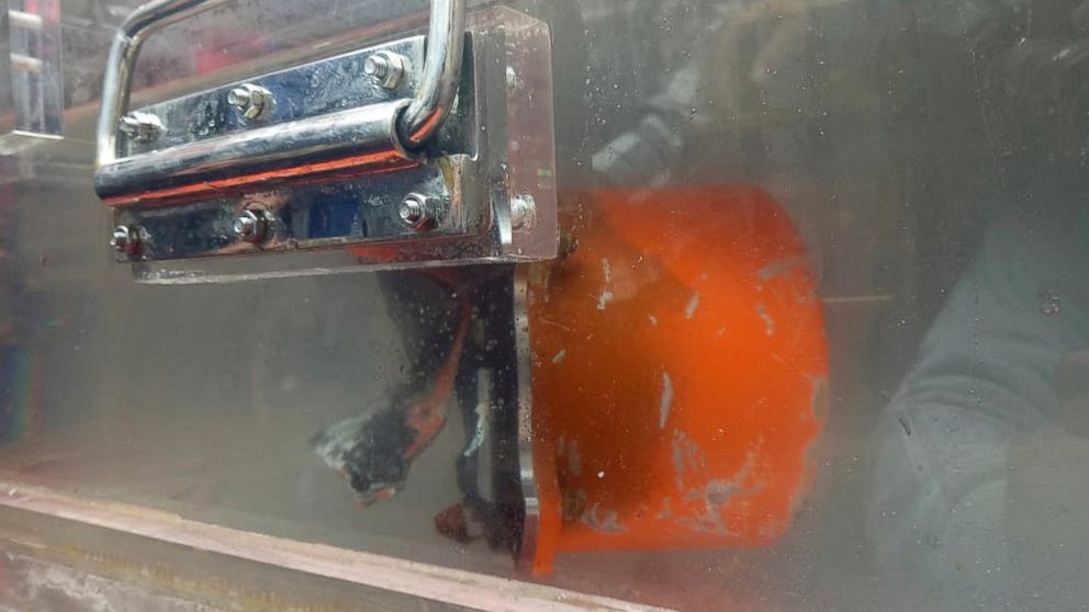 The recovered cockpit voice recorder of Lion Air flight 610 is kept in a water-filled container on board of Indonesian Navy ship KRI Spica in the waters of Tanjung Karawang, Indonesia, Monday, Jan. 14, 2019. Navy divers have recovered the cockpit voice recorder of the Lion Air jet that crashed into the Java Sea in October, Indonesian officials said Monday, in a possible boost to the accident investigation. (AP Photo/Achmad Ibrahim)