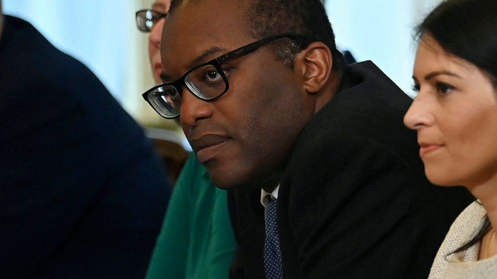 FILE - In this Friday, Sept. 17, 2021 file photo, Britain's Business Secretary Kwasi Kwarteng, centre, participates in the first Cabinet meeting since the reshuffle, at 10 Downing Street, in London, Friday, Sept. 17, 2021. Britain's business secretar