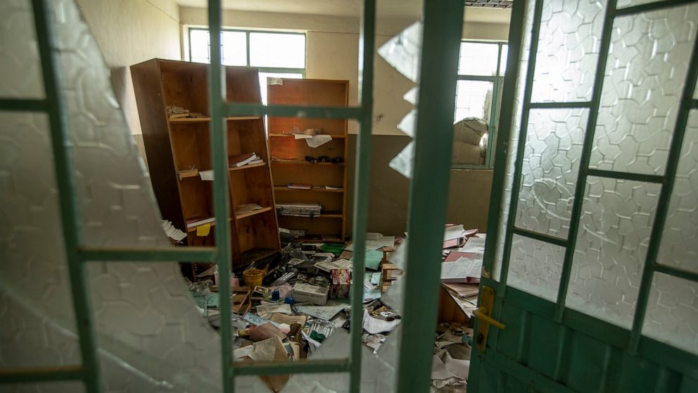 FILE - Medical equipment and files lie damaged and looted by Eritrean soldiers at a hospital which they used as a base, according to witnesses, in Hawzen, in the Tigray region of northern Ethiopia, on May 7, 2021. Eritrean troops and forces from the 