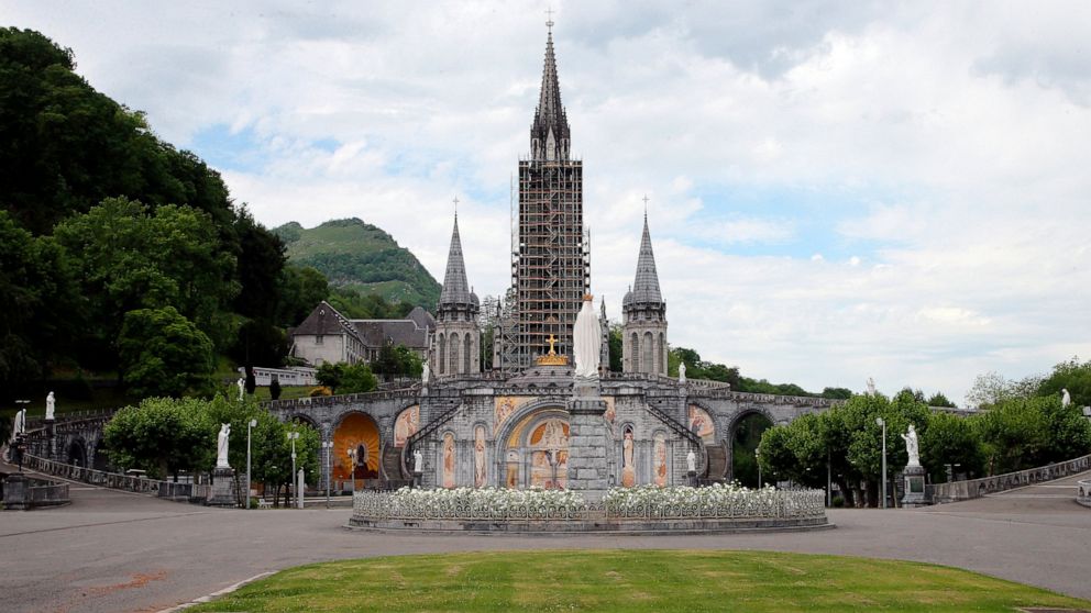 FILE - The closed Basilica of Lourdes is pictured May 8, 2020, in Lourdes, southwestern France. The Vatican came under pressure Tuesday, Dec. 6, 2022, to explain why it didn’t prosecute a famous Jesuit artist and merely let his order restrict the pri