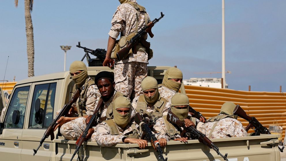 Forces loyal to Abdul Hamid Dbeibah, one of Libya’s two rival prime ministers, secure the streets of the capital, Tripoli, Tuesday May, 17, 2022. Clashes broke out in Tripoli after Dbeibah’s rival, Prime Minister Fathi Bashagha, announced his arrival