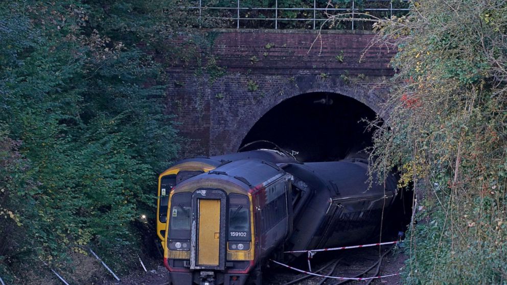 13 hurt after 2 passenger trains crash in southern England