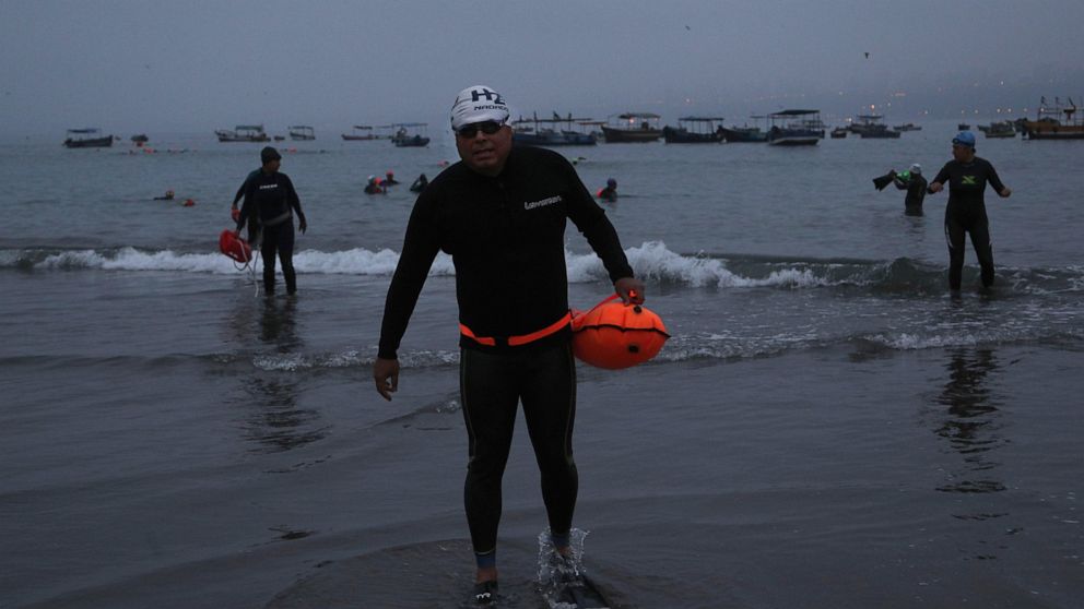 With pools closed, Peruvians turn to open-water swimming