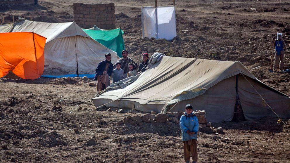 FILE- Pakistani refugees at Gulan camp, some 20 kilometers (12 miles) from the border in the restive Khost province, Afghanistan on Jan. 19, 2015. Pakistan fired off a sharp warning Sunday, April 17, 2022, to Afghanistan's new hardline religious rule