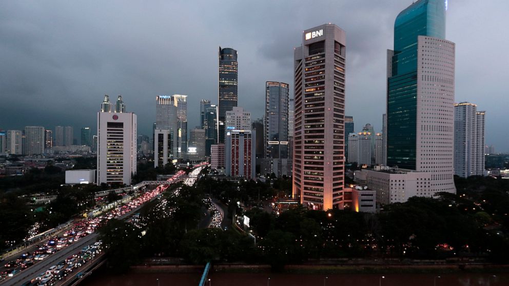 FILE - The central business district skyline is seen during the dusk in Jakarta, Indonesia, Monday, April 29, 2019. Indonesia’s Parliament has passed a long-awaited and controversial revision of its penal code, Tuesday, Dec. 6, 2022, that criminalize