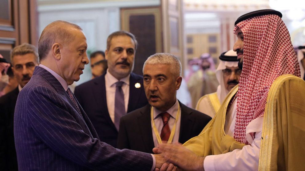 FILE - In this photo made available by the Turkish Presidency, Turkish President Recep Tayyip Erdogan, left, and Saudi Arabia's Crown Prince Mohammed bin Salman speak after their meeting in Jiddah, Saudi Arabia, April 29, 2022. Saudi Crown Prince is 