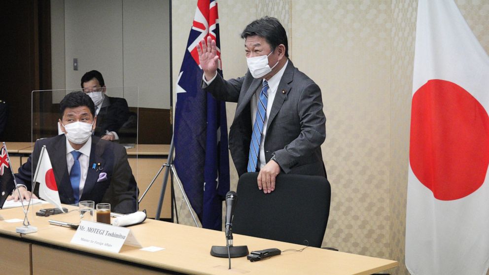 Japan, Australia share China concerns, raise defense ties