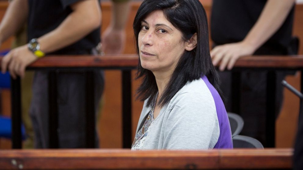 FILE - This May 21, 2015 file photo shows Palestinian Parliament member Khalida Jarrar of the Popular Front for the Liberation of Palestine (PFLP) attending a court session at the Israeli Ofer military base near the West Bank city of Ramallah. Palest