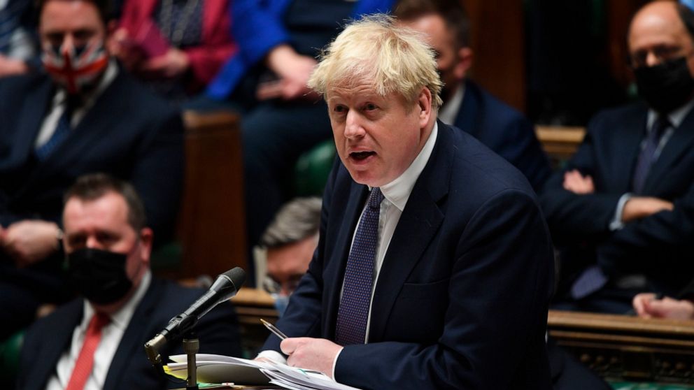 In this handout photo provided by UK Parliament, Britain's Prime Minister Boris Johnson speaks during Prime Minister's Questions in the House of Commons, London, Wednesday, Jan. 5, 2022. (Jessica Taylor/UK Parliament via AP)
