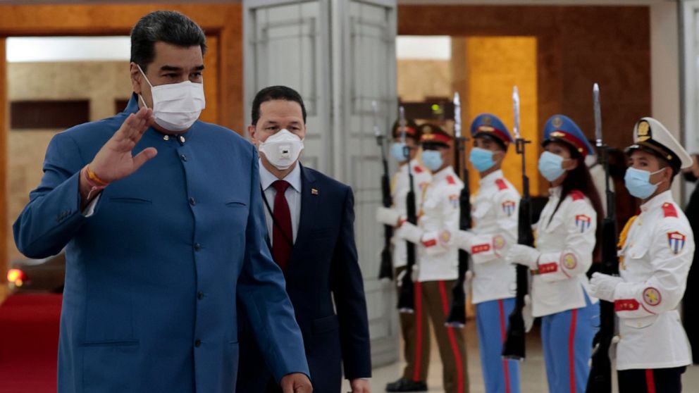 Venezuela's President Nicolas Maduro arrives to Revolution Palace to attend the XXI ALBA Summit in Havana, Cuba, Friday, May 27, 2022. (Ernesto Mastrascusa/Pool Photo via AP)
