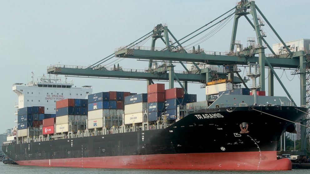 Containers are loaded on a ship at Saigon port in Ho Chi Minh city, Vietnam May 3, 2020. Vietnam on Monday, June 8, 2020, ratified a significant trade deal with the European Union, which is expected boost the country's manufacturing sector and export