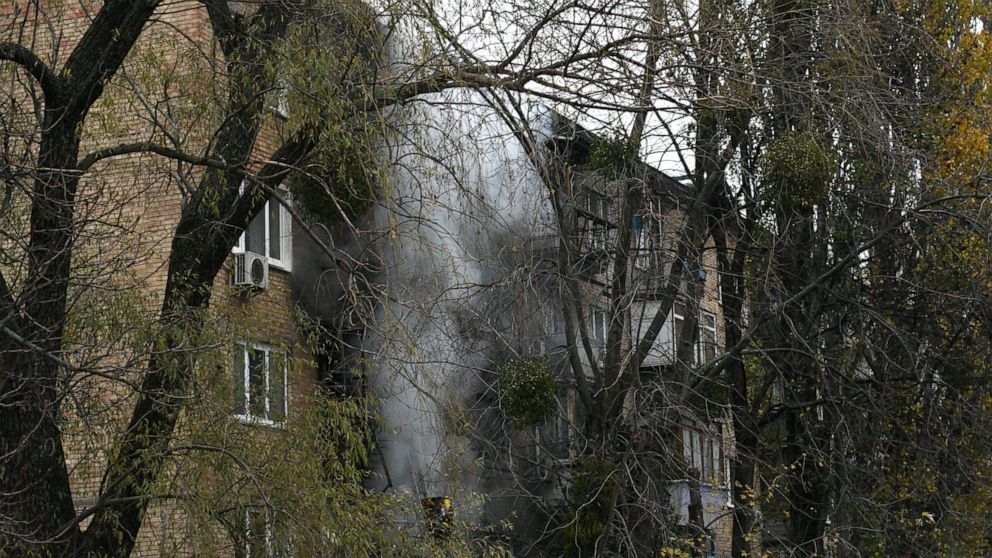 A damaged building seen at the scene of Russian shelling in Kyiv, Ukraine, Tuesday, Nov. 15, 2022. Strikes hit residential buildings in the heart of Ukraine's capital Tuesday, authorities said. Further south, officials announced probes of alleged Rus