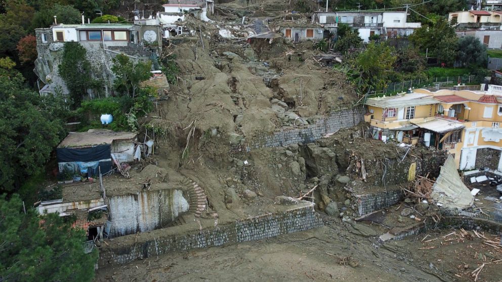 An aerial view of damaged houses after heavy rainfall triggered landslides that collapsed buildings and left as many as 12 people missing, in Casamicciola, on the southern Italian island of Ischia, Sunday, Nov. 27, 2022. Authorities said that the lan