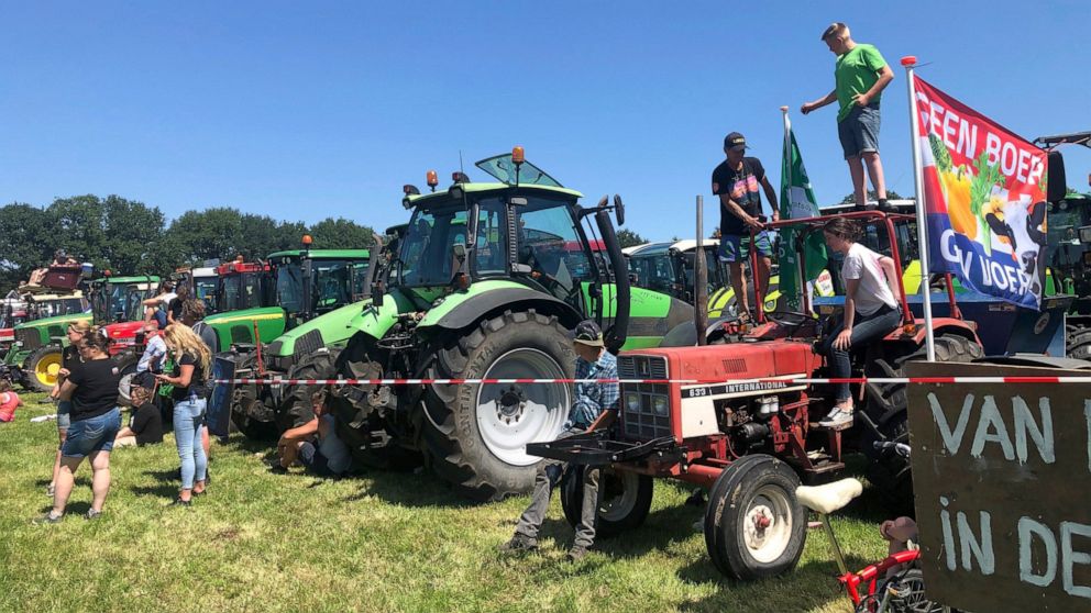 Dutch farmers protesting against the government’s plans to reduce emissions of nitrogen oxide and ammonia gather for a demonstration at Stroe, Netherlands, Wednesday, June 22, 2022. Thousands of farmers drove their tractors along roads and highways a